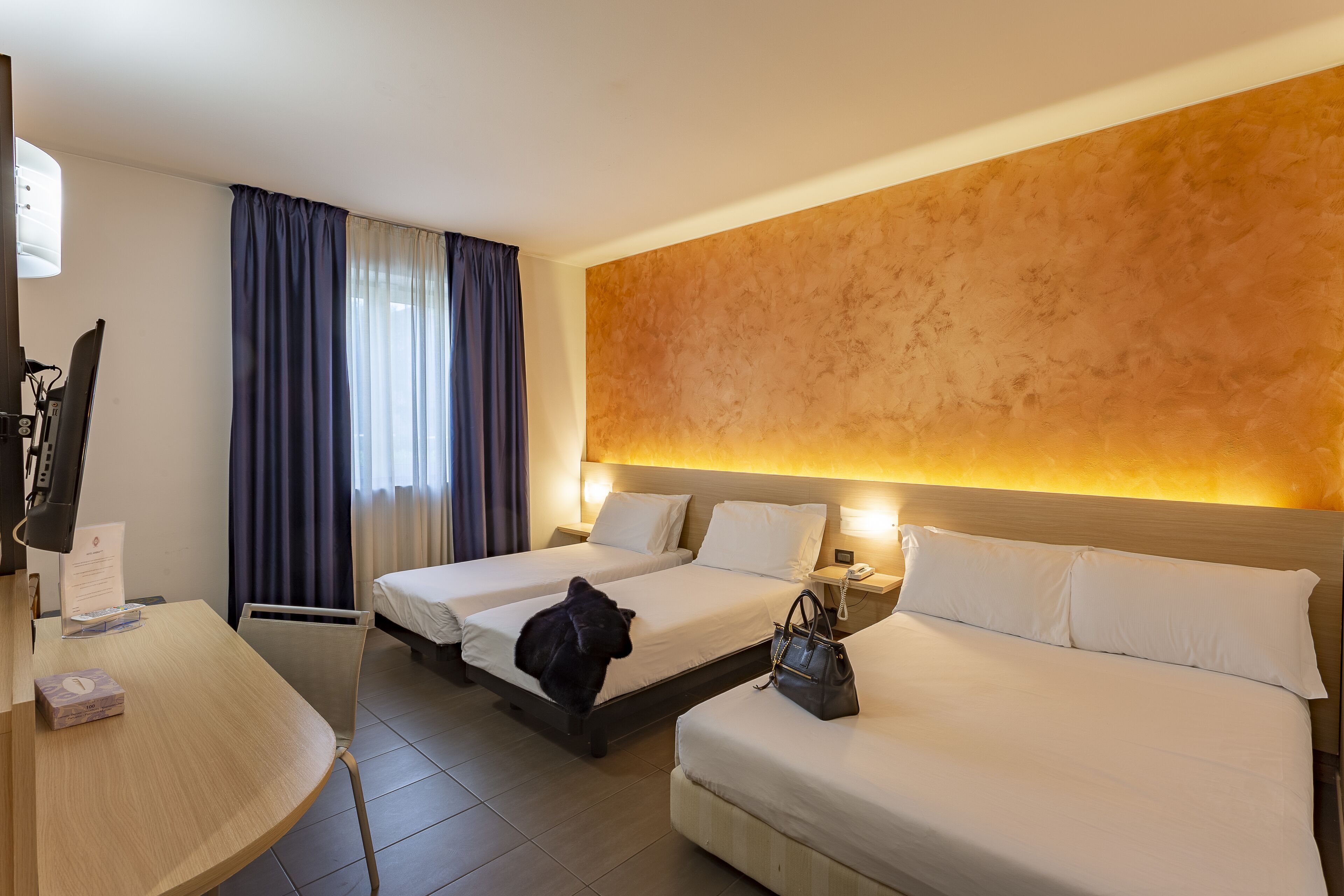 Hypo-allergenic bedding, minibar, in-room safe, desk