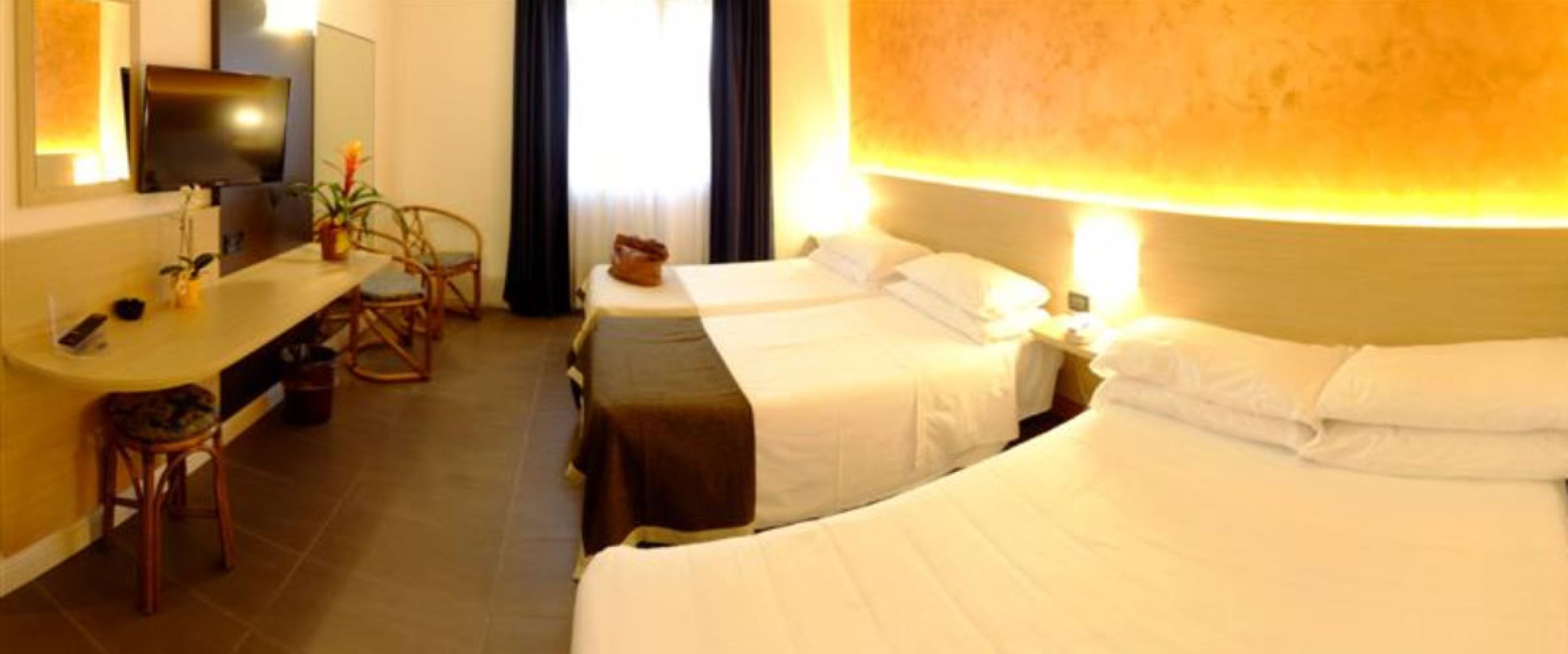 Hypo-allergenic bedding, minibar, in-room safe, desk