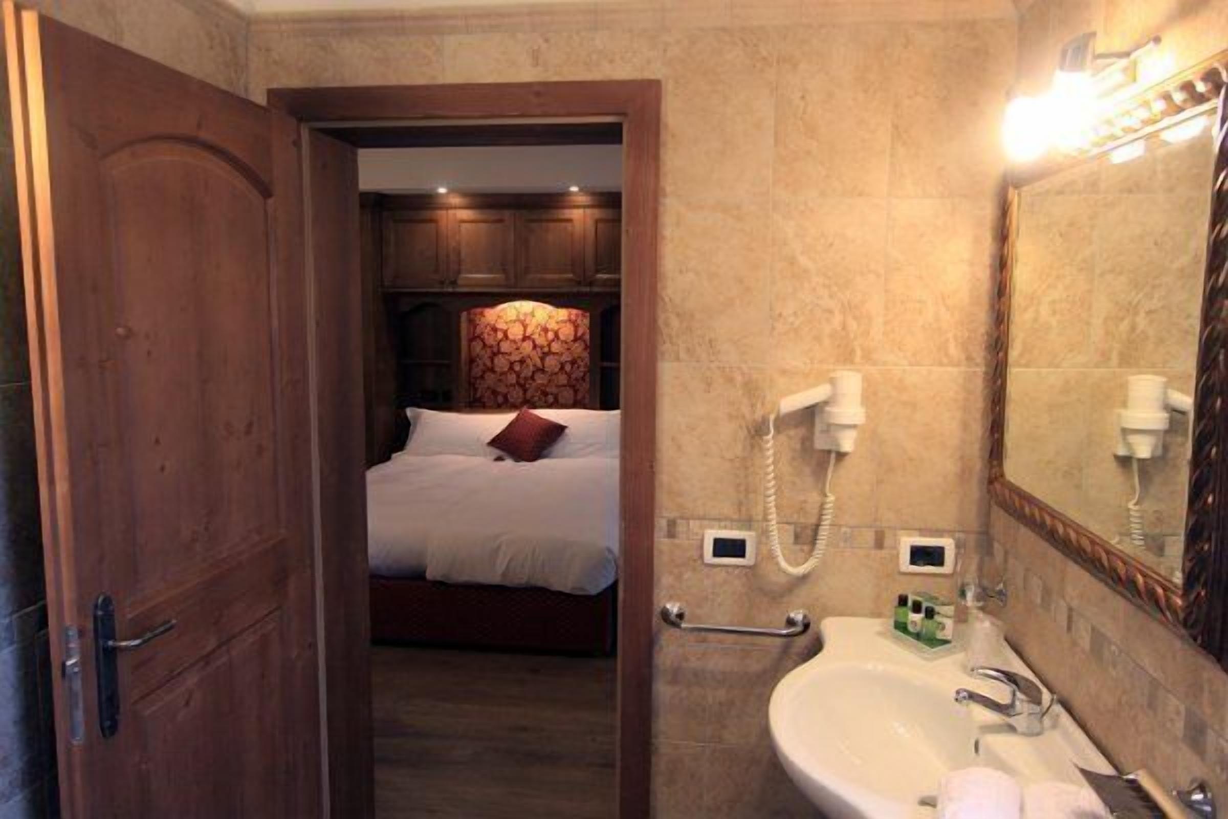 free toiletries, hair dryer, bidet, towels