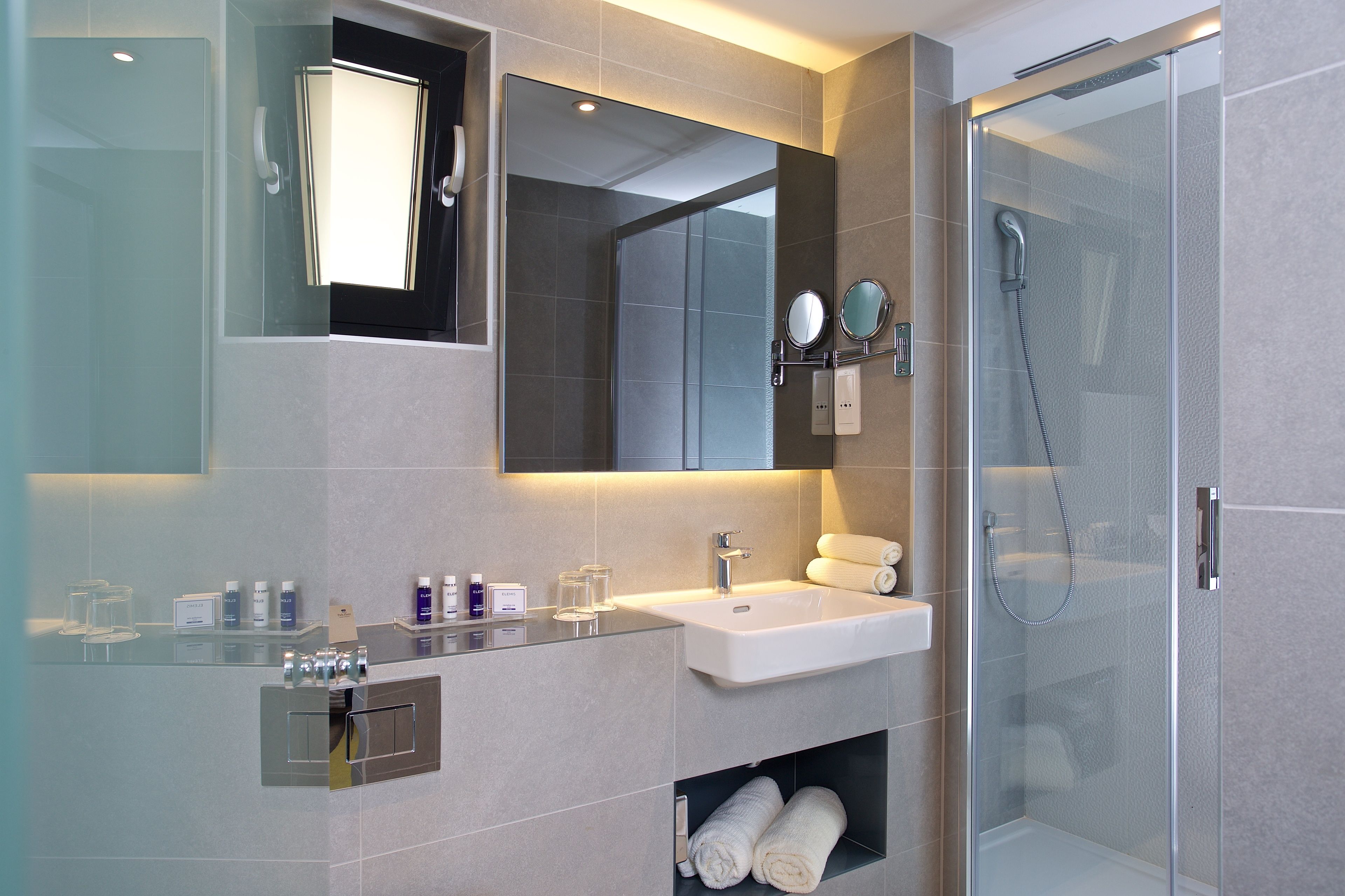 shower, free toiletries, hair dryer, towels