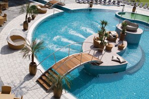 2 outdoor pools, open 7:30 AM to 10:00 PM, pool cabanas (surcharge)