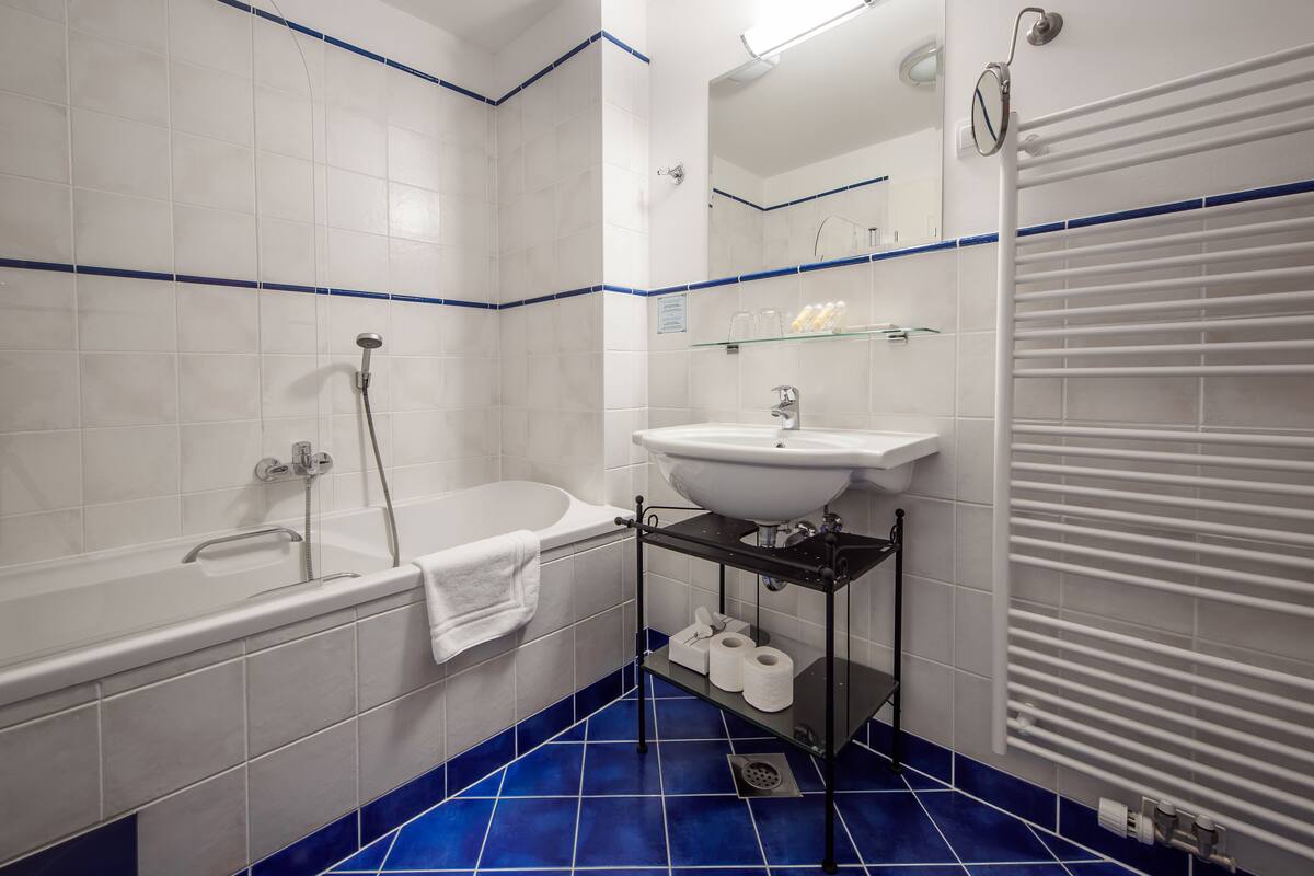 basic room | bathroom | hair dryer, bathrobes, slippers, towels