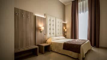 Premium bedding, down comforters, minibar, in-room safe