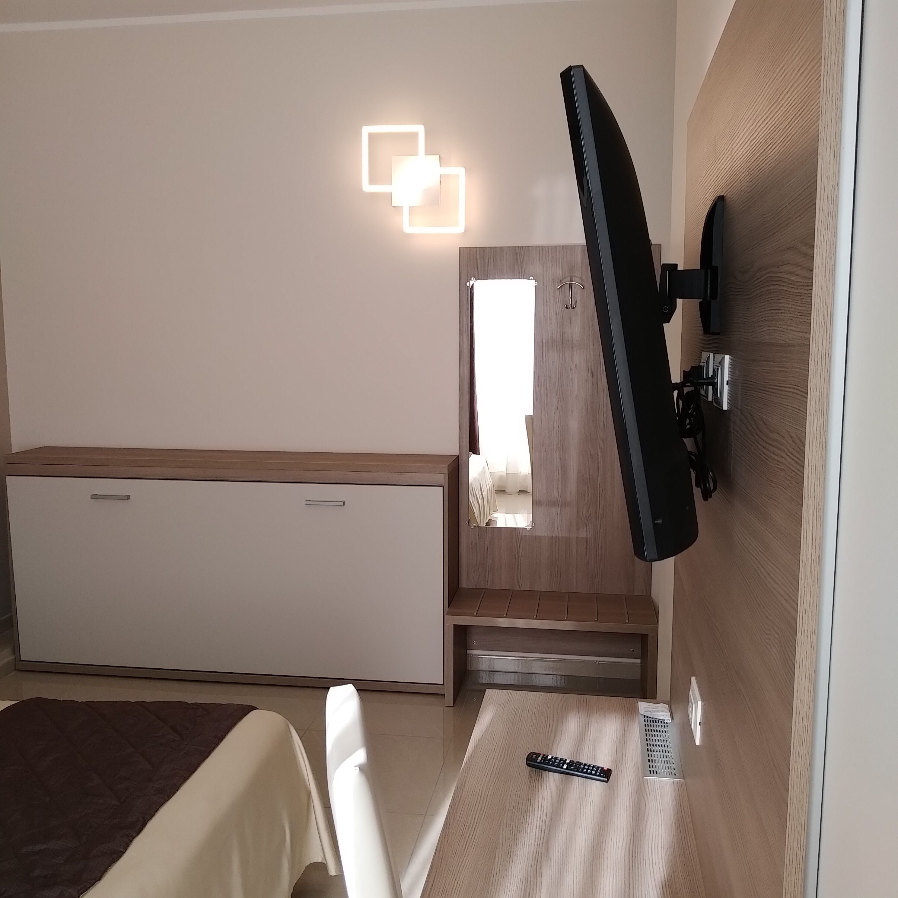 premium bedding, down duvets, minibar, in-room safe