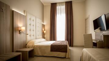 Premium bedding, down comforters, minibar, in-room safe