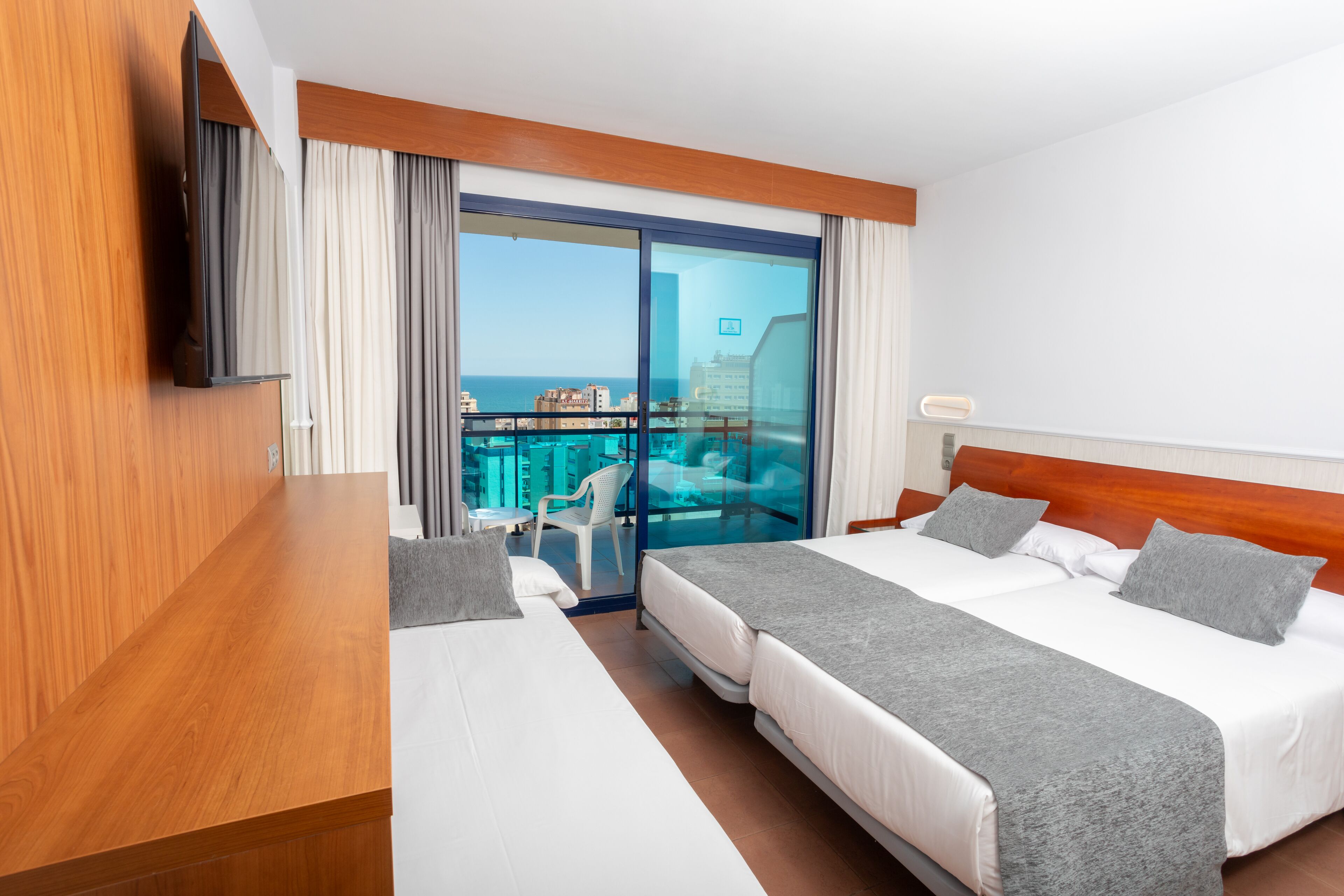 double room, sea view | minibar, in-room safe, desk, blackout curtains