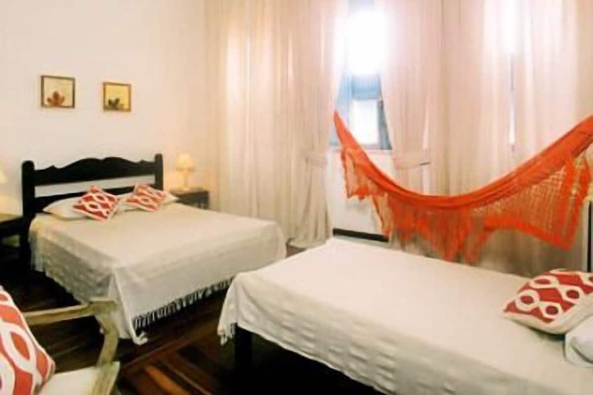 Standard Double or Twin Room | Minibar, in-room safe, iron/ironing board, free cribs/infant beds