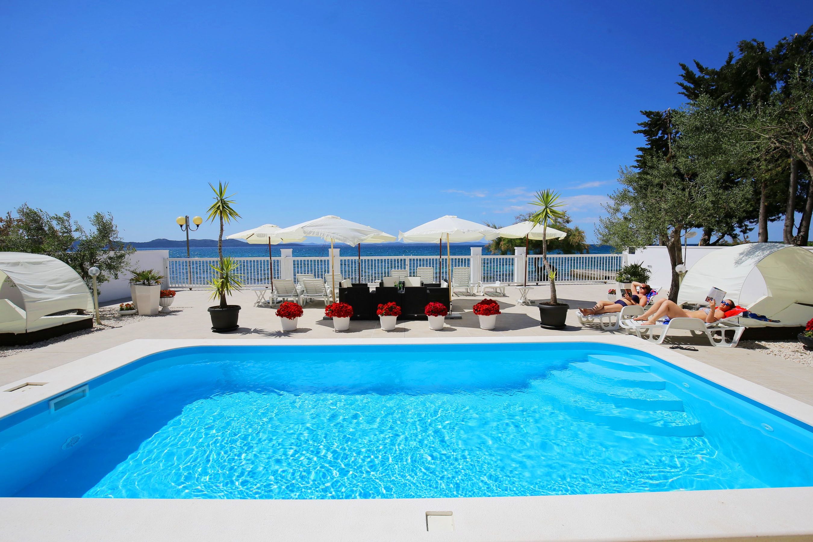 Budget Room | Outdoor pool | Seasonal outdoor pool, pool umbrellas, sun loungers