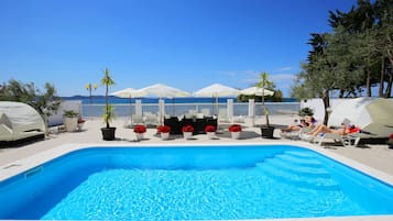 Budget Room | Outdoor pool | Seasonal outdoor pool, pool umbrellas, sun loungers