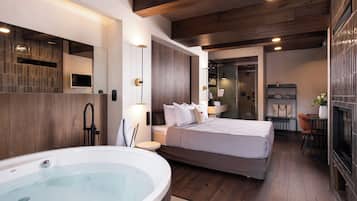 The Hot Tub Suite with Fireplace & Steam Shower | Private spa tub