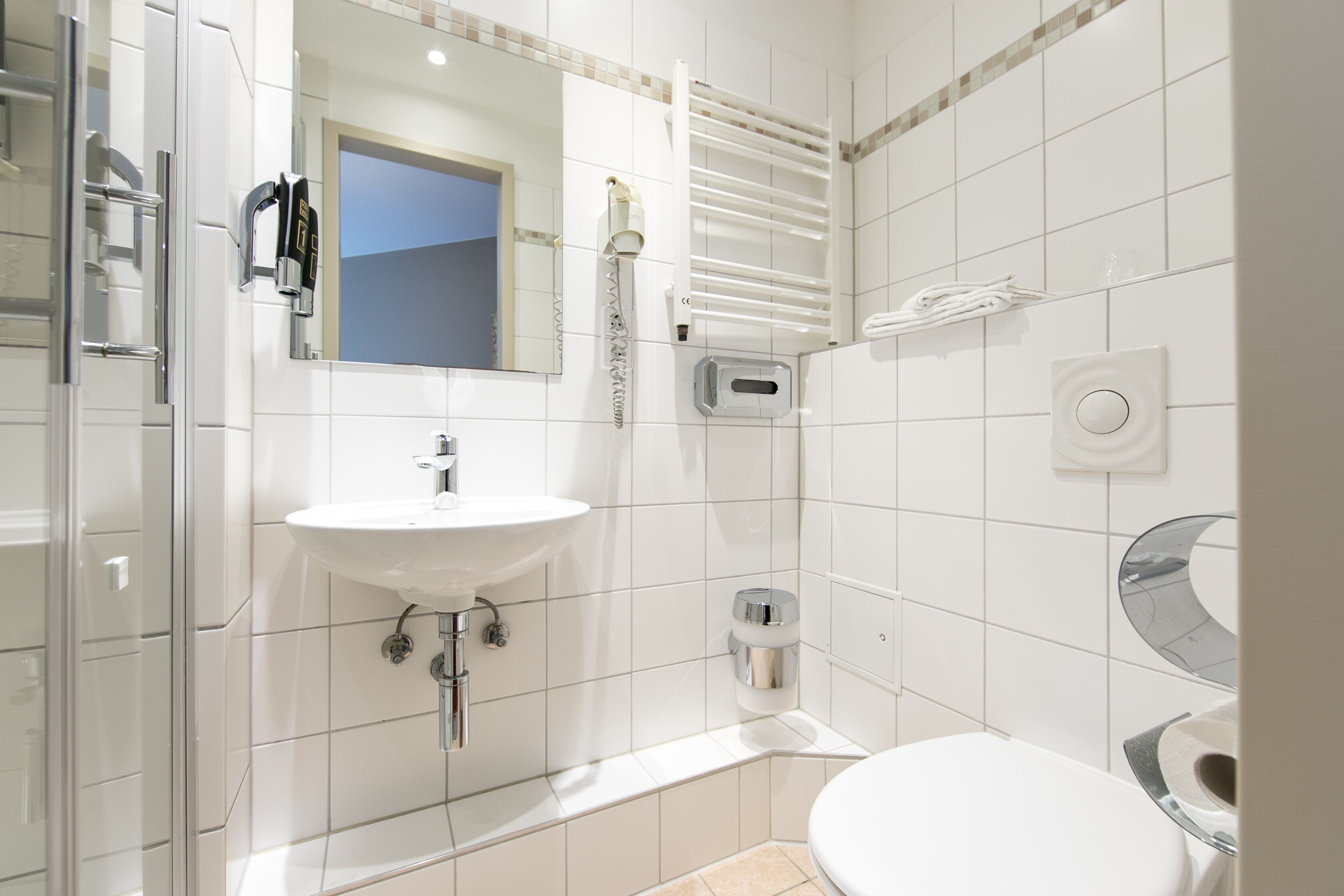 comfort quadruple room | bathroom | shower, free toiletries, hair dryer, towels