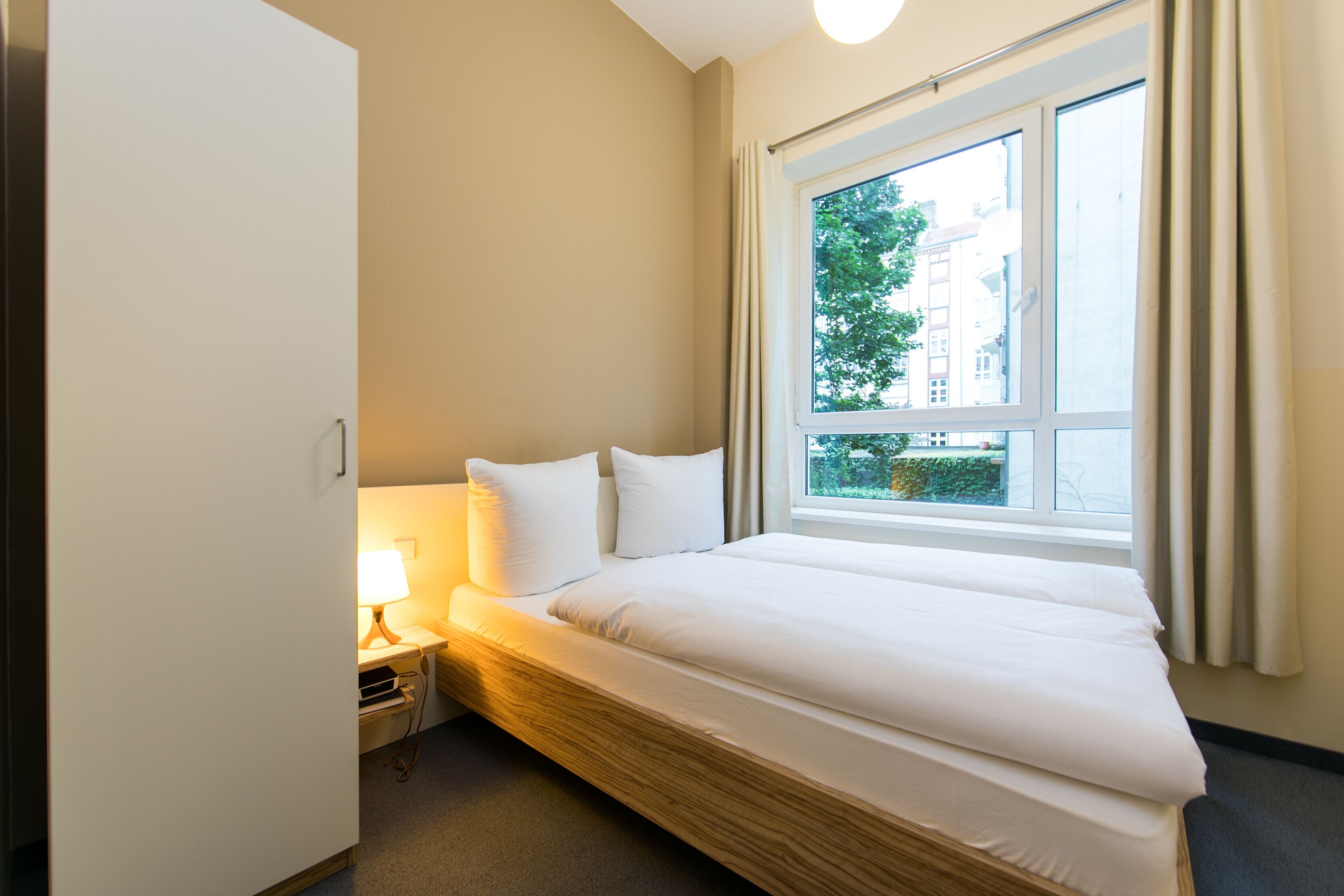 standard double room, 1 bedroom, view, courtyard area | hypo-allergenic bedding, in-room safe, desk, laptop workspace