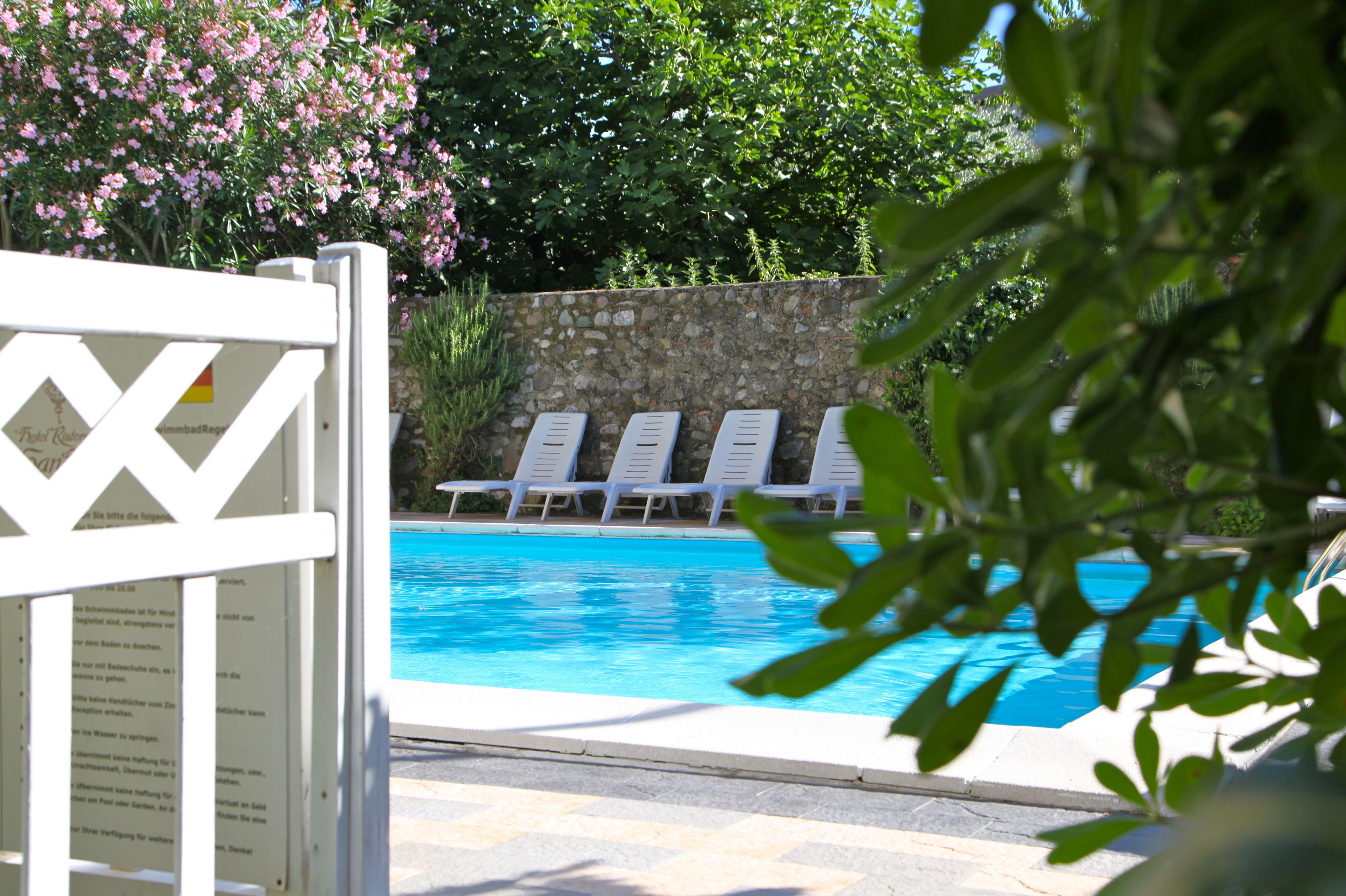 outdoor pool, pool loungers