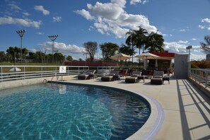 Outdoor pool, pool umbrellas, sun loungers