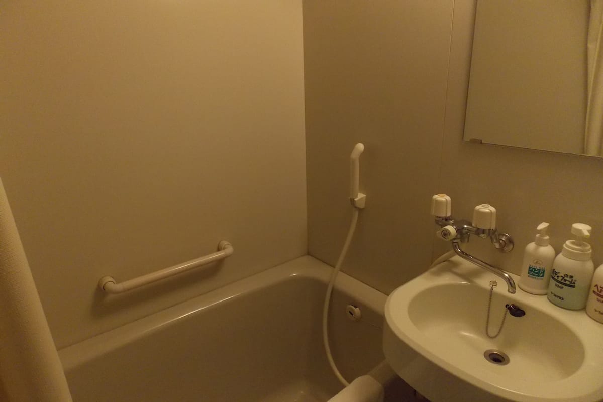 slippers, electronic bidet, towels