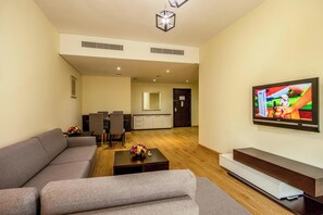 32-inch flat-screen TV with cable channels, TV - TIME Ruby Hotel Apartments (Sharjah)