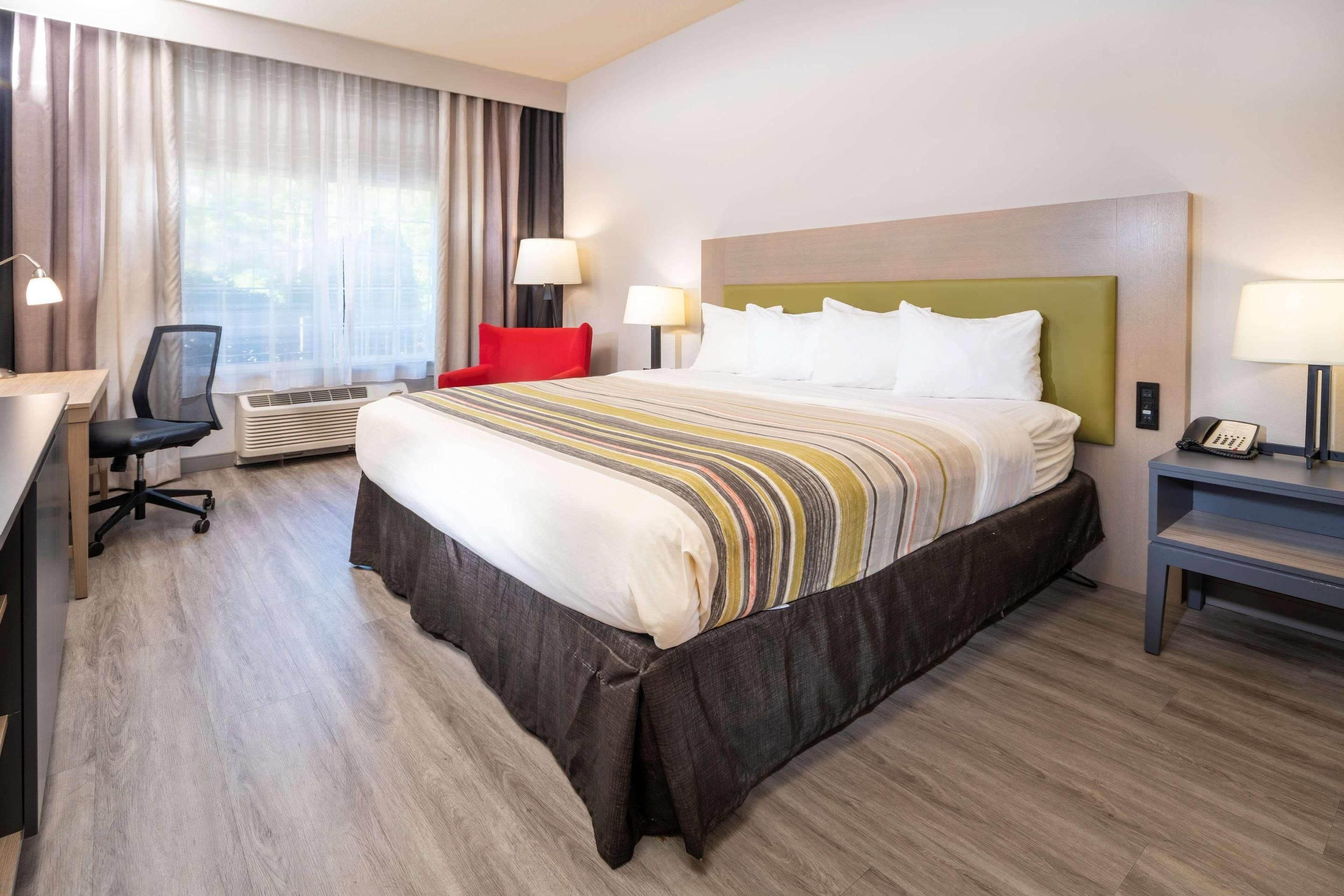 Desk, blackout curtains, iron/ironing board, free cots/infant beds