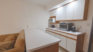 Room, 2 Double Beds, Non Smoking | Private kitchenette | Coffee/tea maker, mini-fridge, microwave