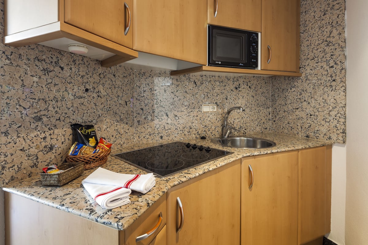 fridge, microwave, electric kettle, high chair