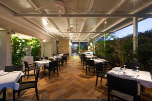 Breakfast, lunch, dinner served; Mediterranean cuisine, pool views 