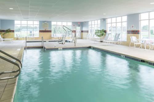 Indoor pool, open 6 AM to midnight, sun loungers