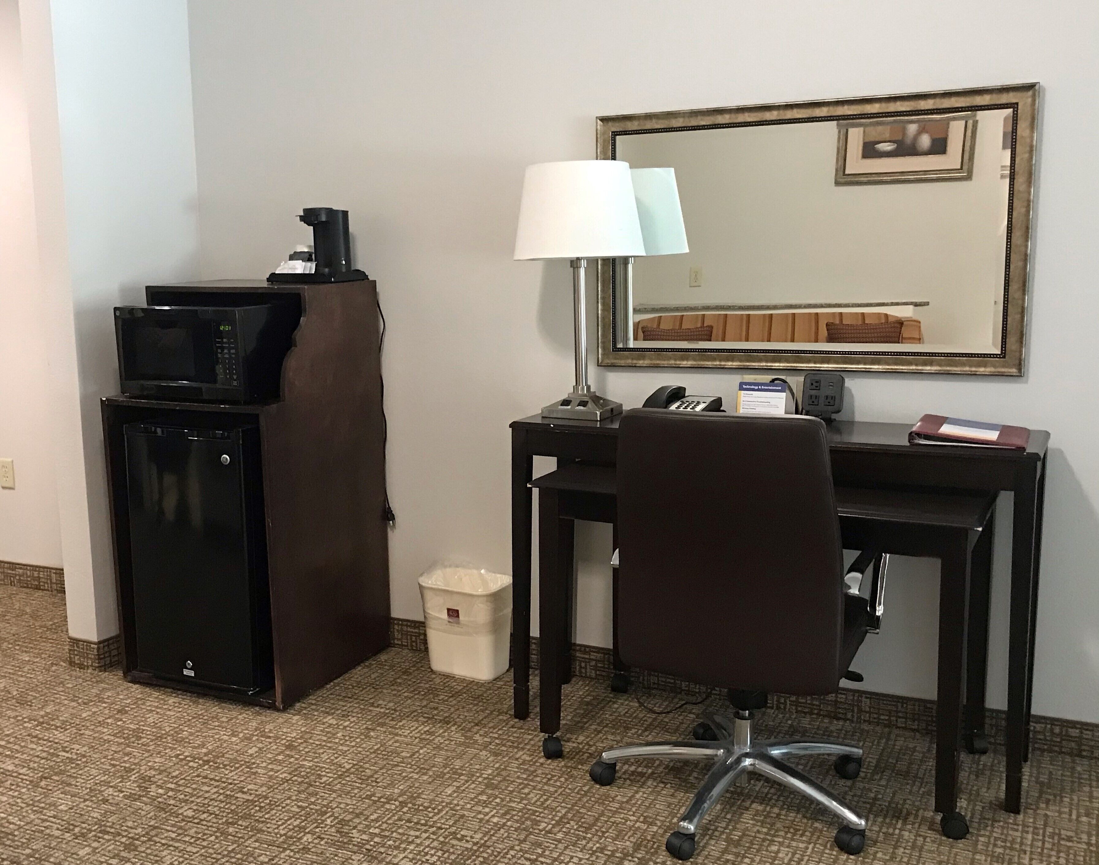 hypo-allergenic bedding, desk, laptop workspace, blackout curtains