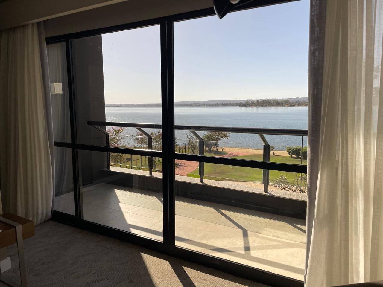 Premium Room, 1 King Bed, Pool View | Minibar, in-room safe, individually furnished, blackout curtains