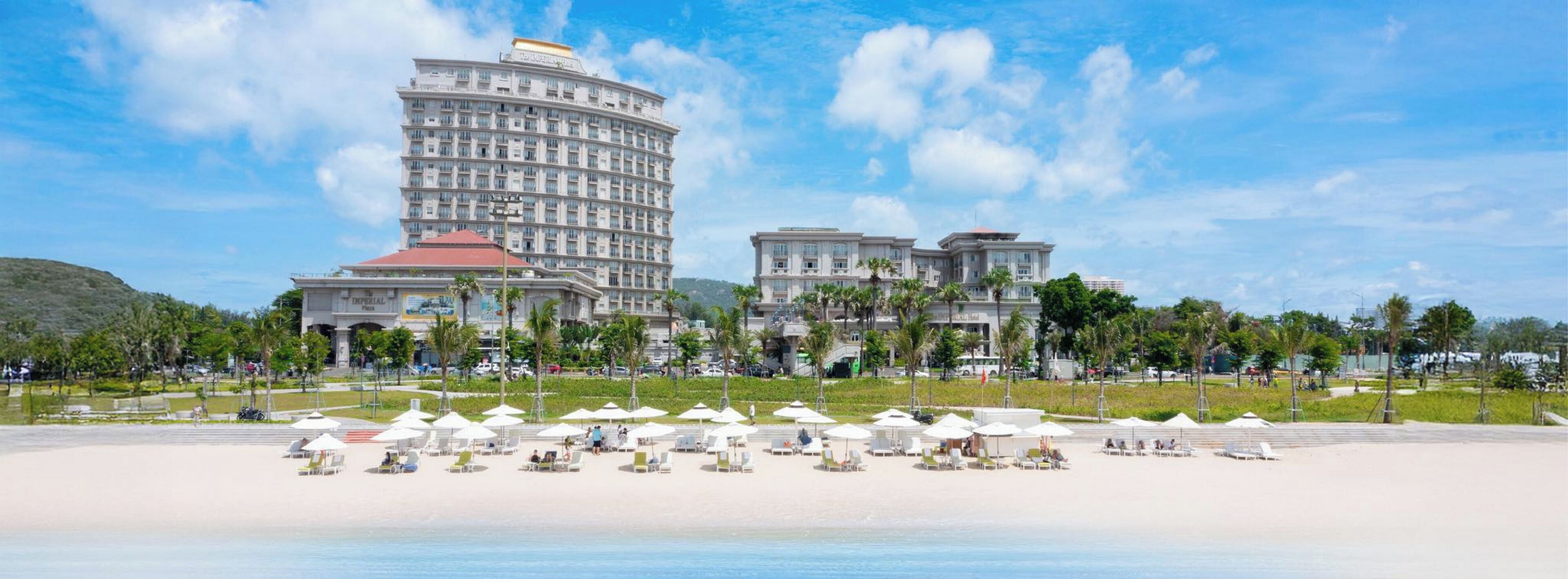Private beach, white sand, sun loungers, beach umbrellas