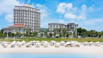 Private beach, white sand, sun loungers, beach umbrellas