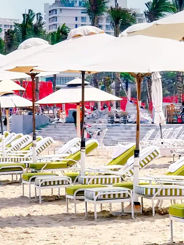 Private beach, white sand, sun loungers, beach umbrellas