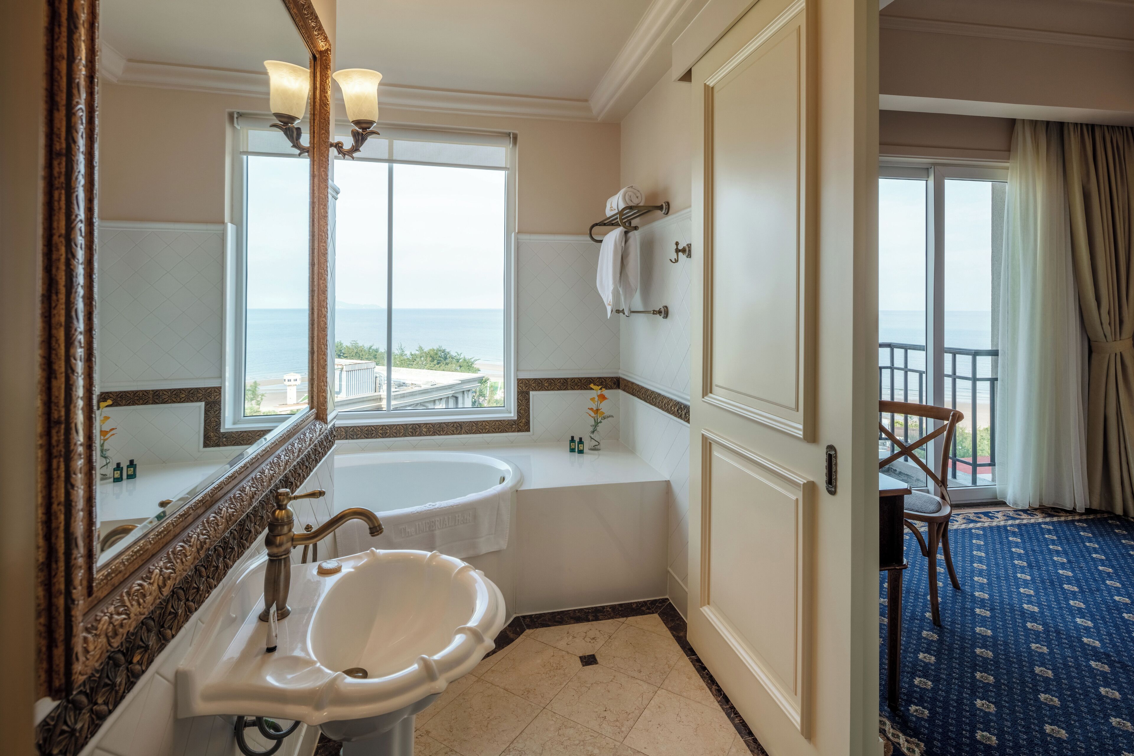 residence suite oceanview | bathroom | hair dryer, bathrobes, slippers, towels