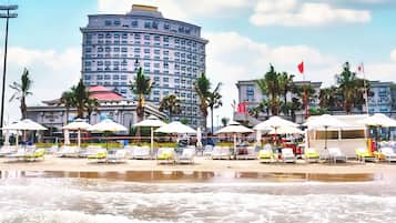 Private beach, white sand, sun loungers, beach umbrellas