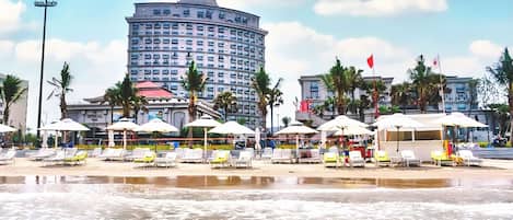 Private beach, white sand, sun-loungers, beach umbrellas