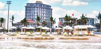 Private beach, white sand, sun-loungers, beach umbrellas