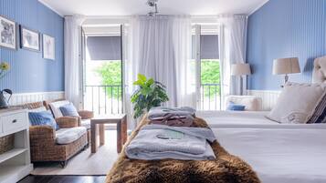 Habitación doble superior | Minibar, tabla de planchar con plancha, wifi gratis y ropa de cama