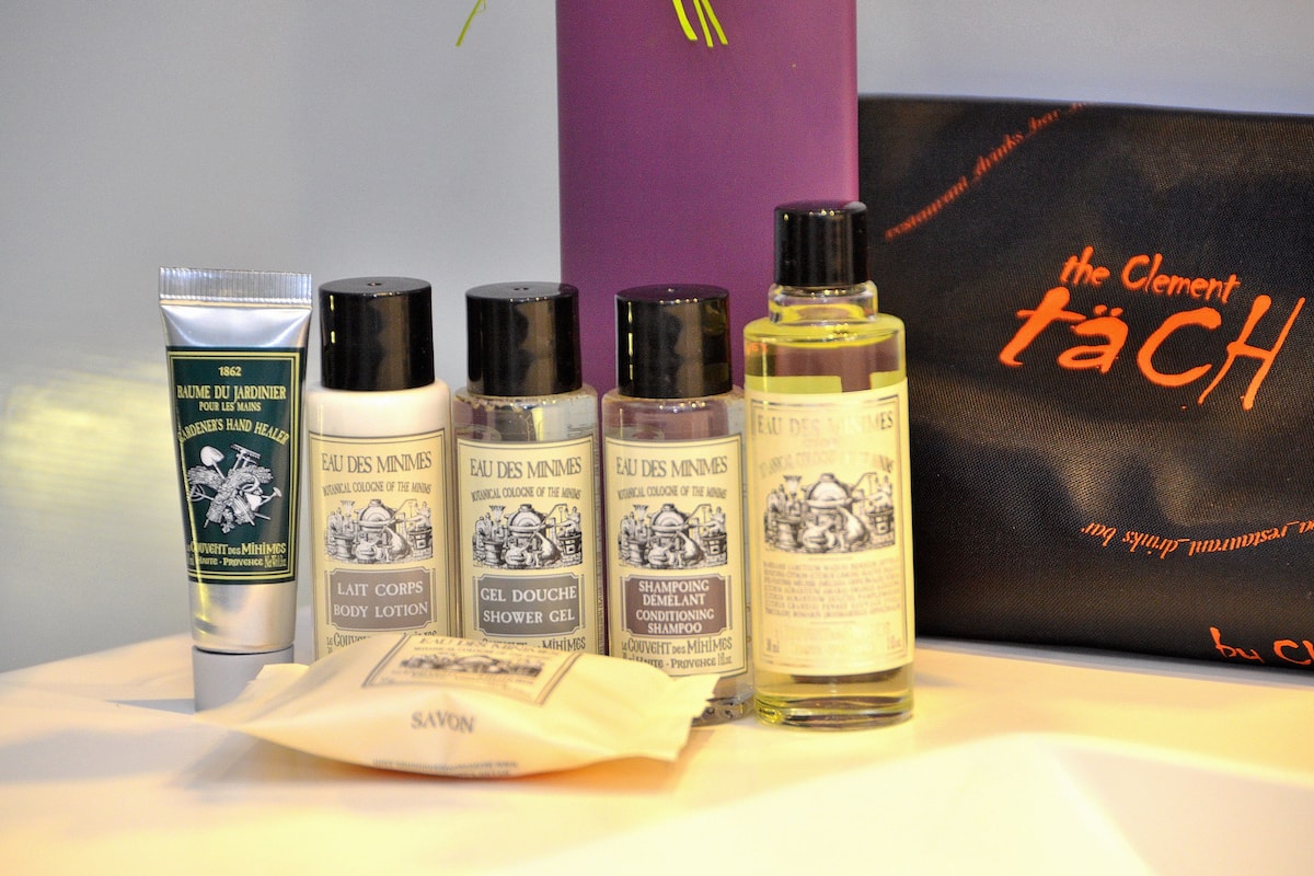 shower, designer toiletries, hair dryer, slippers