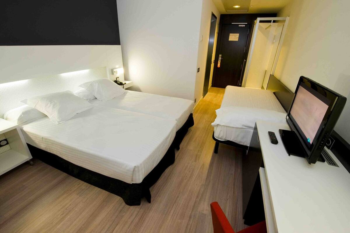 down duvets, memory-foam beds, minibar, in-room safe