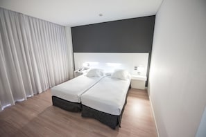 Down duvets, memory-foam beds, minibar, in-room safe