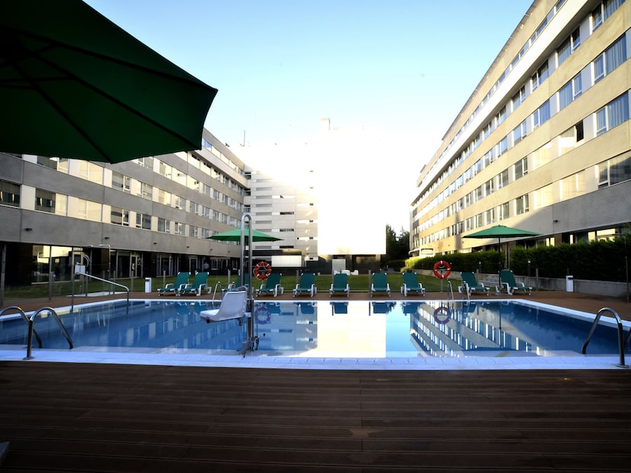 Seasonal outdoor pool, pool umbrellas, pool loungers