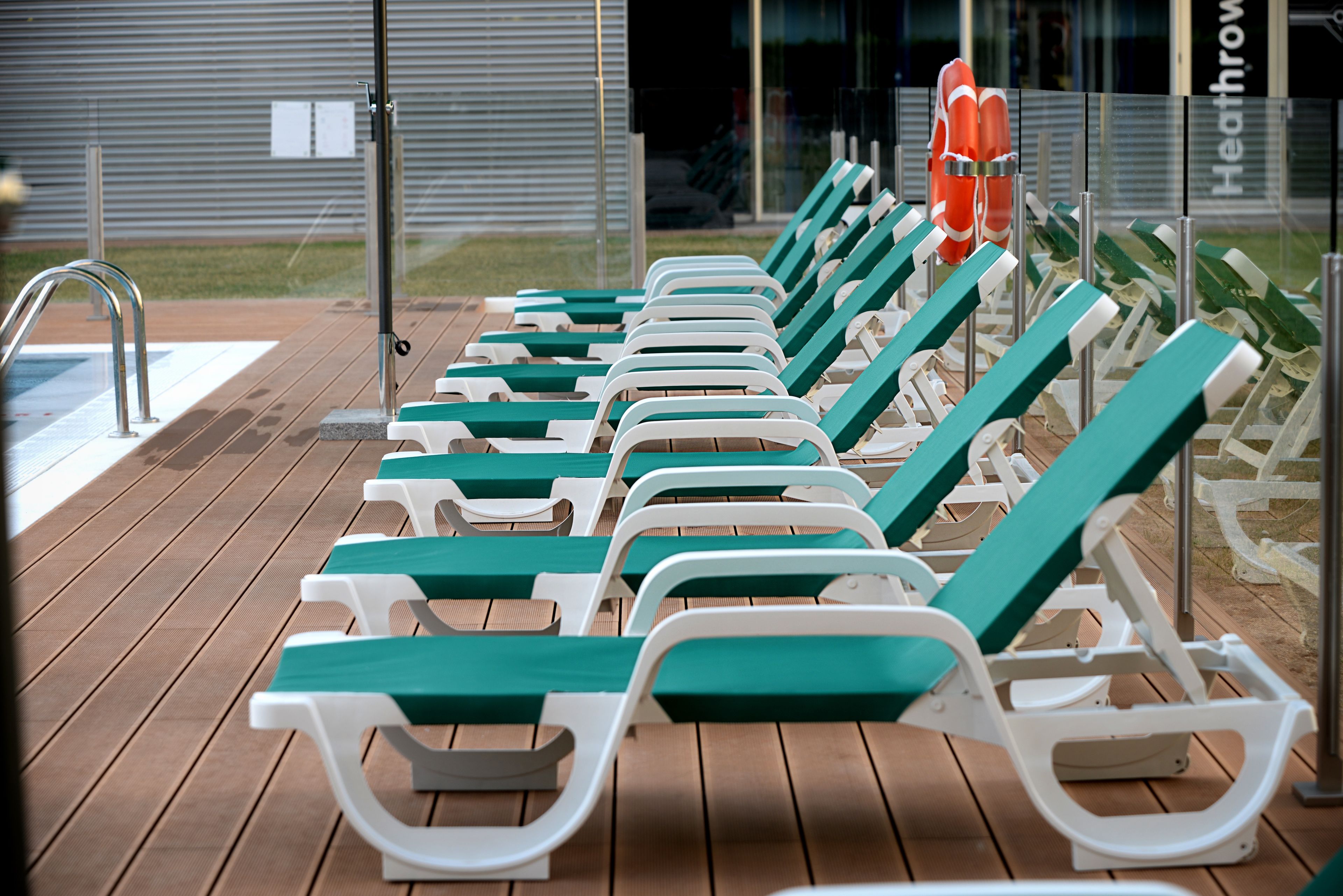 seasonal outdoor pool, open 11:00 am to 8:00 pm, pool umbrellas