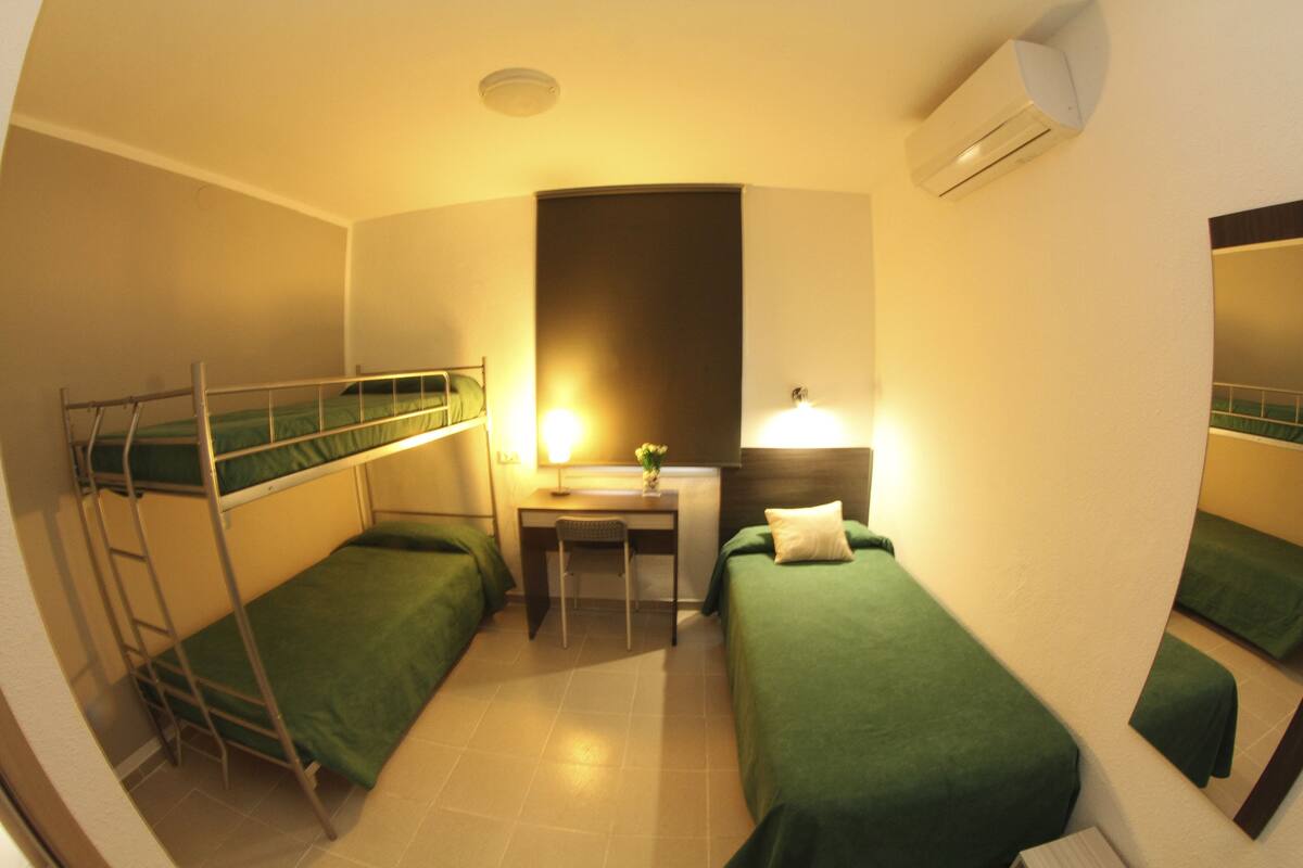 Desk, blackout curtains, rollaway beds, free WiFi