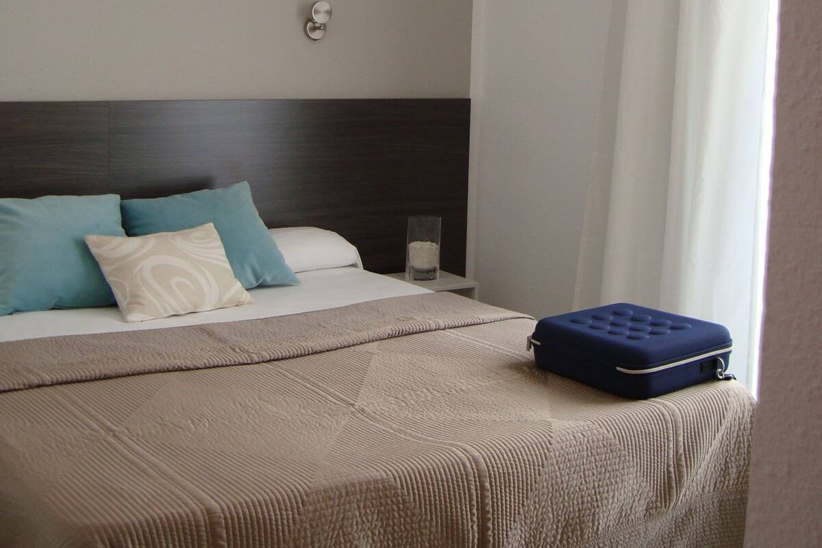 Desk, blackout curtains, rollaway beds, free WiFi