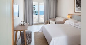 Superior Double Room, Balcony, Partial Sea View | Minibar, in-room safe, desk, cots/infant beds