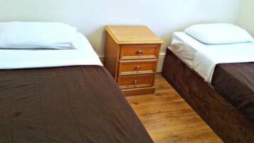 Basic Twin Room, Shared Bathroom | In-room safe, iron/ironing board, WiFi