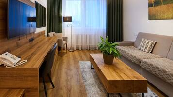 Familien-Suite | Wohnbereich | Flachbildfernseher