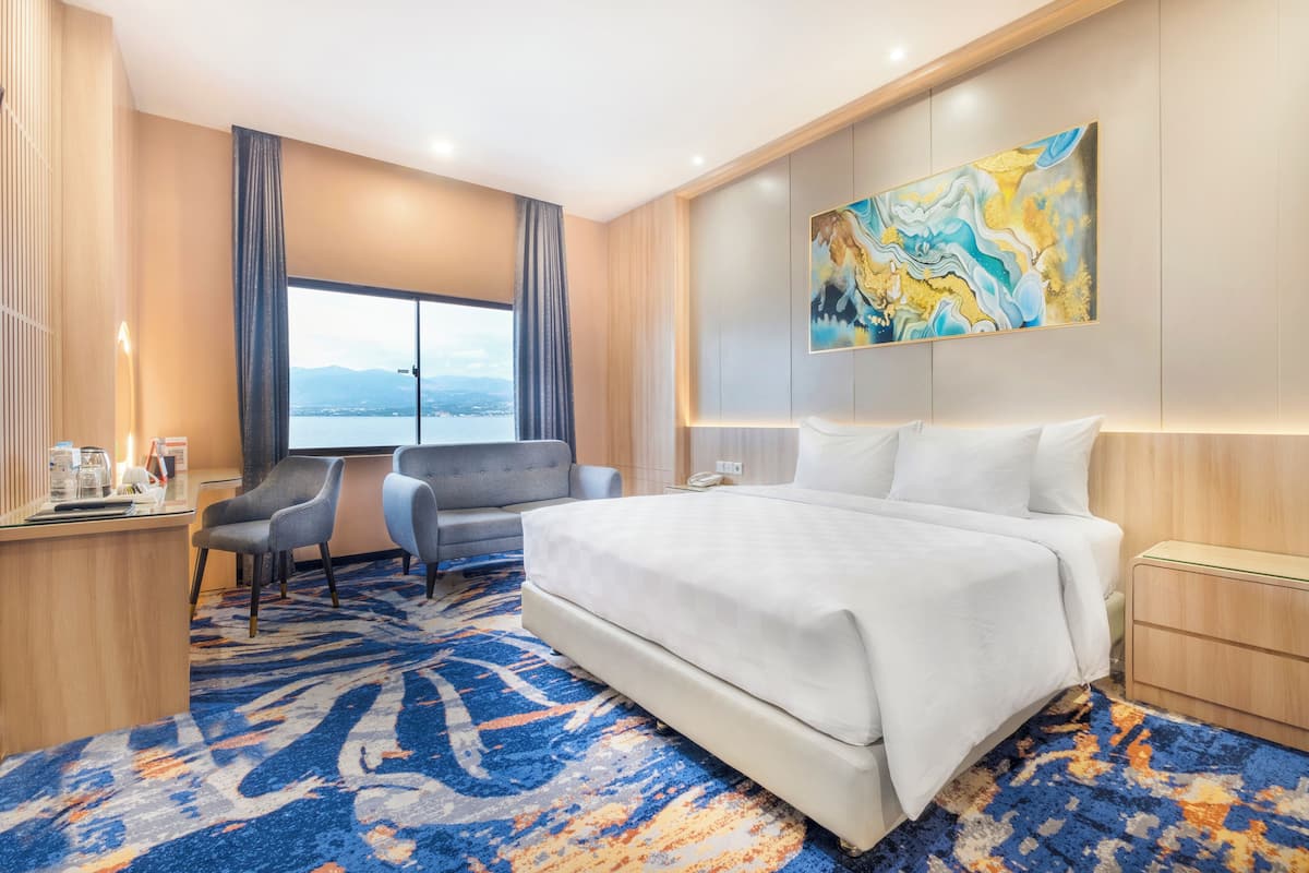 Deluxe Double Room, Sea View | Premium bedding, minibar, in-room safe, desk