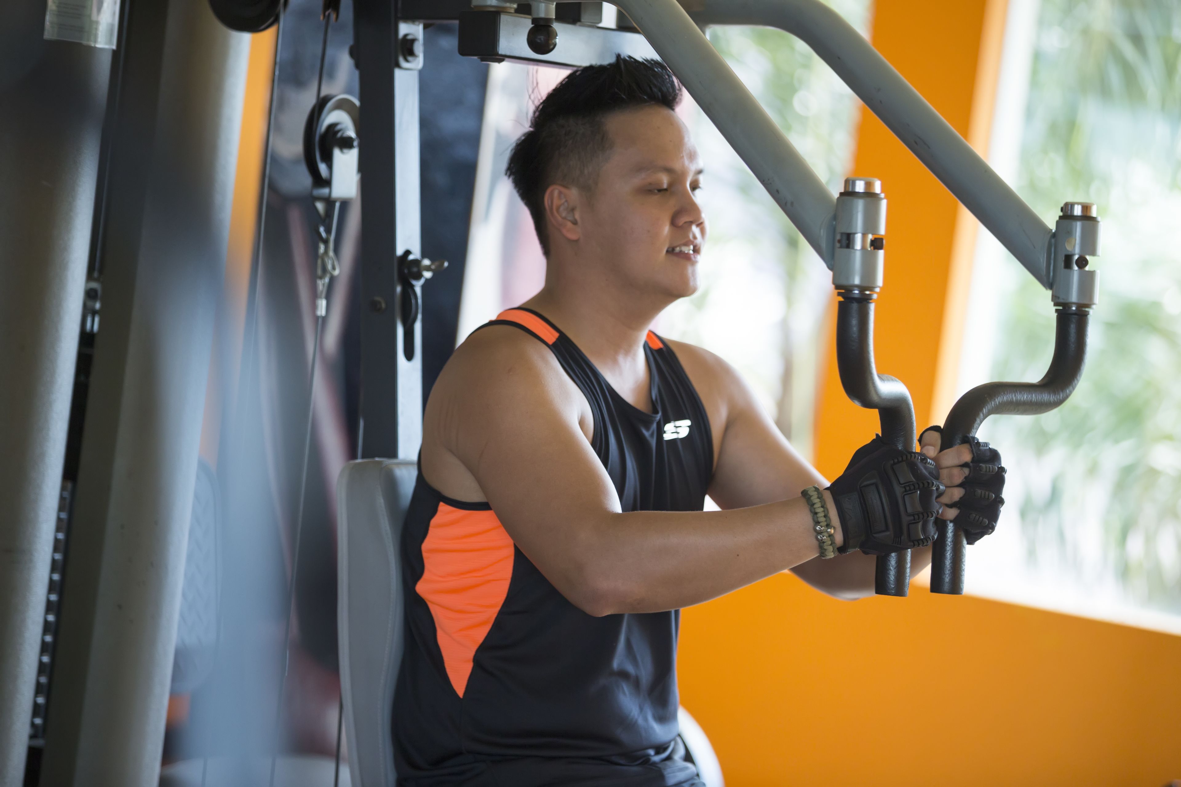 A person using gym equipment.