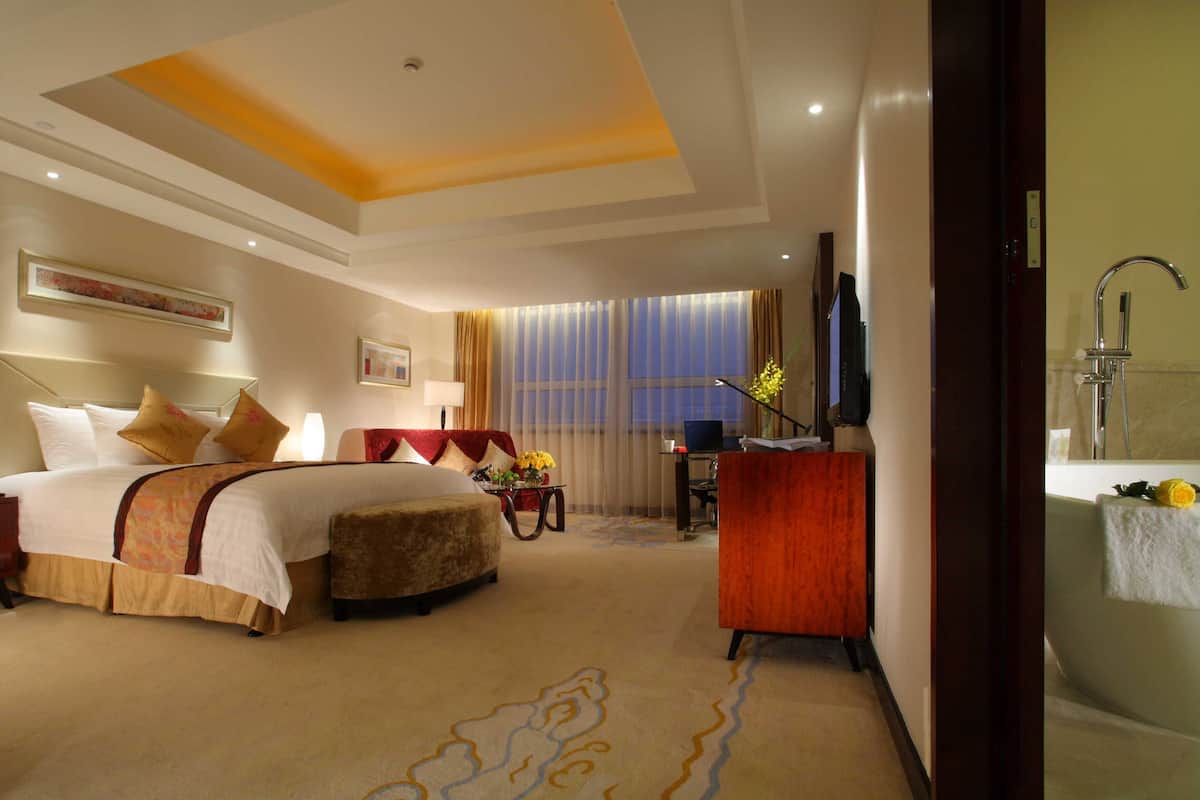 Premium bedding, down comforters, pillowtop beds, minibar