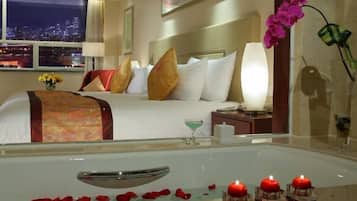 Premium bedding, down comforters, pillowtop beds, minibar