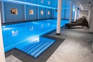 Indoor pool, open 7:00 AM to 8:00 PM, sun loungers